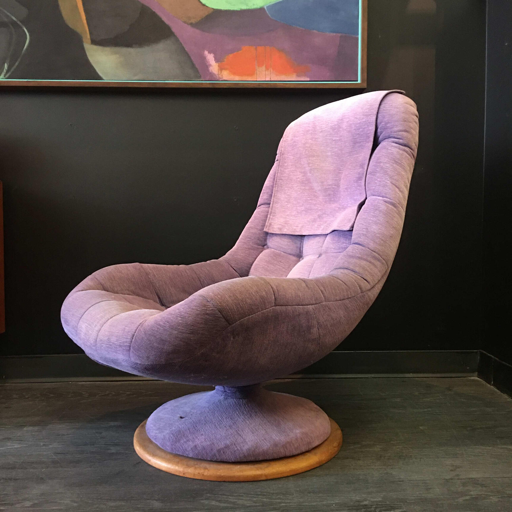 vintage purple swivel chair with abstract art in the background. lethbridge Vintage